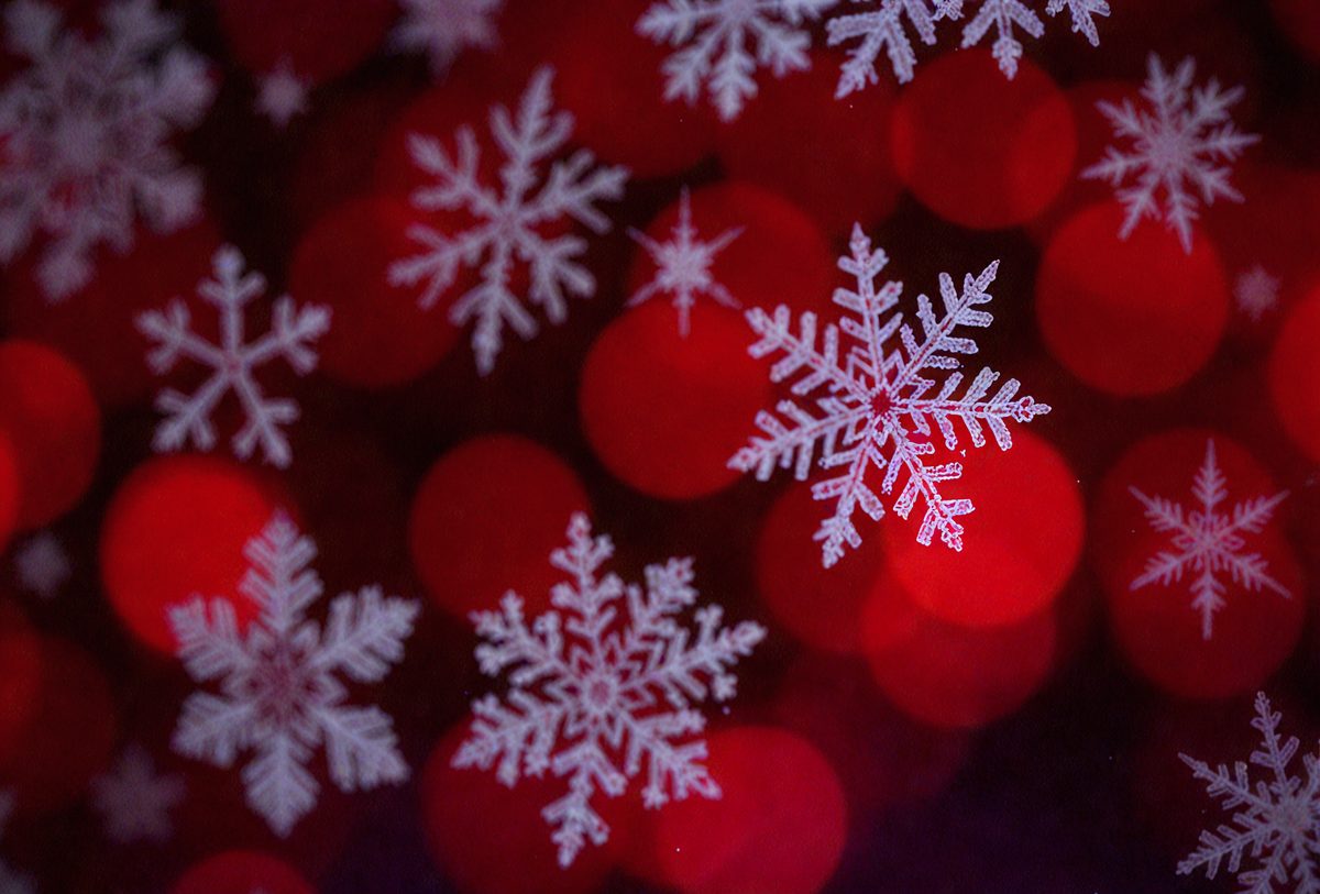 freepik__red-bokeh-background-with-snowflake-designs-captur__35793_250517120507_holliday Backgrounds_00001.png